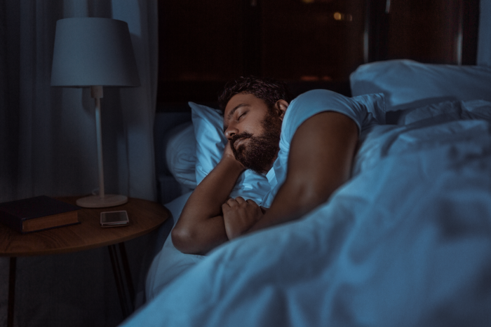 Man sleeping in bed